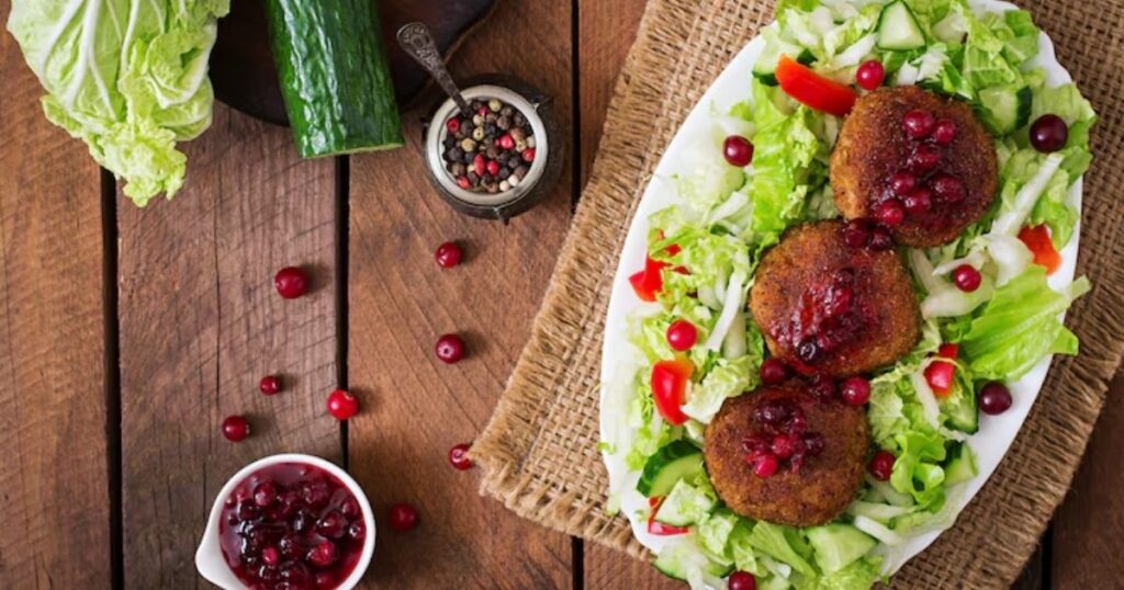 Seared Scallops and Baby Spinach with Spiced Pomegranate Glaze